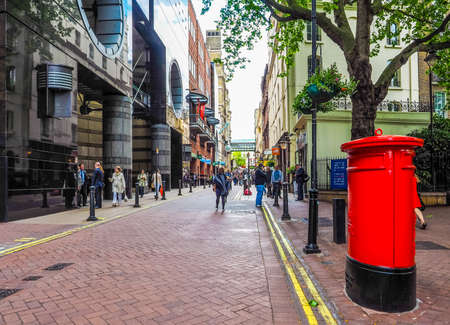 LONDON, UK - JUNE 09, 2015: Tourists in busy central London street (HDR)のeditorial素材