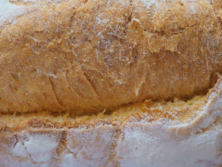 Bread staple food prepared from a bread of flour and water by bakingの写真素材