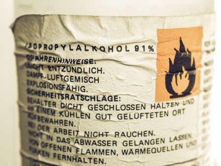 Vintage looking Detail of iso propyl alkohol danger signの写真素材