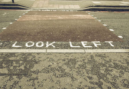 Vintage looking Look Left sign in a London streetの写真素材