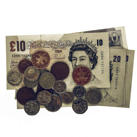 Vintage looking Detail of British Pounds banknotes and coins