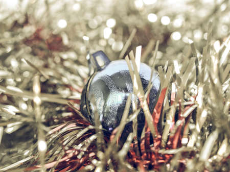 Vintage looking Tinsel and baubles for Christmas tree decorationの写真素材