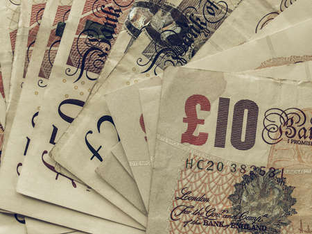 LONDON, UK - SEPTEMBER 05, 2015: Vintage looking British Pound banknotes currency of the United Kingdomの写真素材