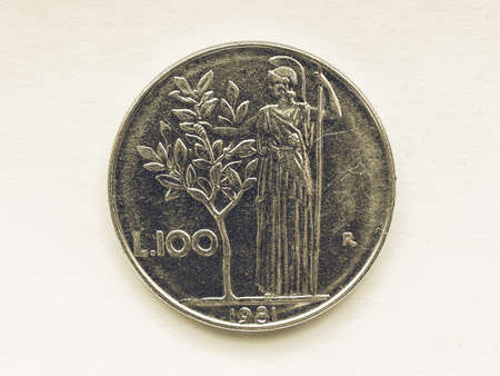 Vintage looking Old Italian liras coins now withdrawn and replaced by Euroの写真素材