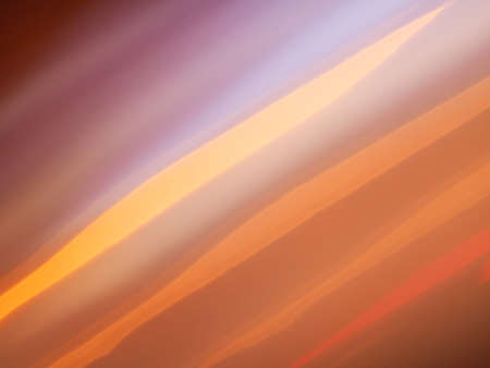 Pink orange and brown defocused blur useful as a backgroundの写真素材