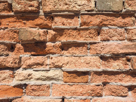 Red brick wall useful as a background