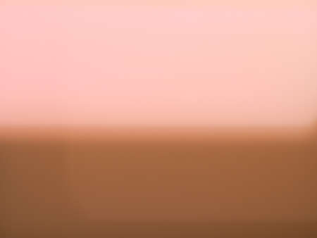 Pink and brown defocused blur useful as a backgroundの写真素材