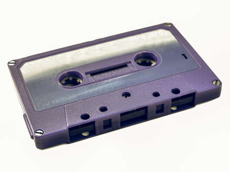 Vintage looking Magnetic tape cassette for audio music recording - isolated over white backgroundの写真素材