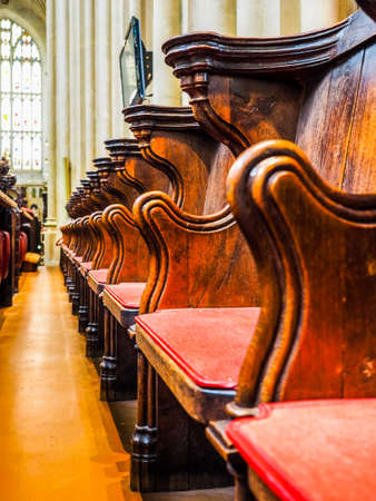 BATH, UK - CIRCA SEPTEMBER 2016: HDR Wooden seats in church choir in Bath Cathedral