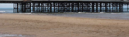 View of the sea beach and a pierの写真素材