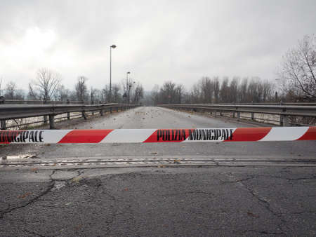 Local Police line (Polizia Municipale in Italian), do not cross. Bridge access blocked for flood riskの写真素材