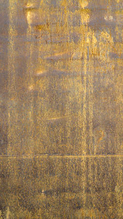 Brown rusted steel useful as a background - vertical