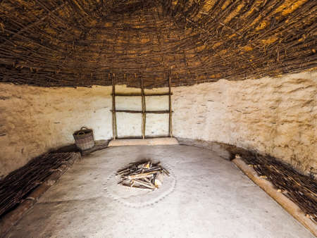 AMESBURY, UK - CIRCA SEPTEMBER 2016: HDR Stonehenge neolithic houses at the prehistoric megalithic stone monumentのeditorial素材
