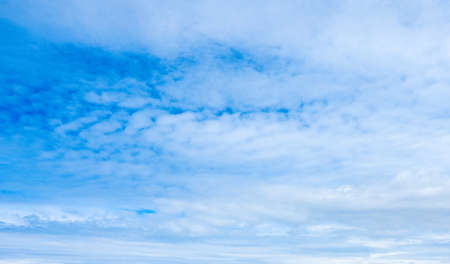 Blue sky with clouds useful as a background (HDR)