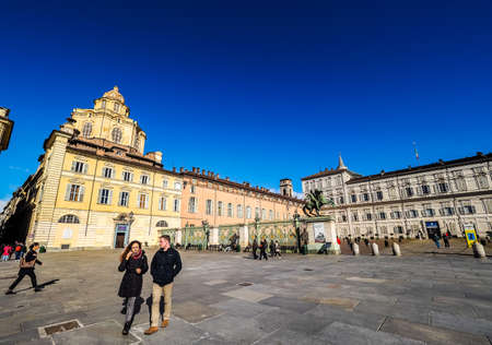 TURIN, ITALY - CIRCA MARCH 2016: Tourists visiting Piazza Castello central baroque square (HDR)のeditorial素材