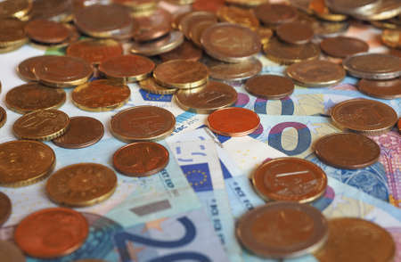 euro eur banknotes and coins currency of european union eu useful as a backgroundの写真素材