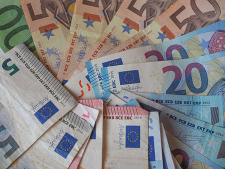euro eur banknotes and coins currency of european union eu useful as a backgroundの写真素材