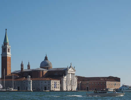 VENICE, ITALY - CIRCA SEPTEMBER 2016: Gondola in front of San Giorgio Maggiore island in the Venice Lagoonのeditorial素材