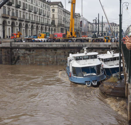 TURIN, ITALY - CIRCA NOVEMBER 2016: Rescue attempt of boats named Valentino and Valentina from River Po floodのeditorial素材