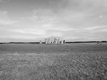 WILTSHIRE, UK - CIRCA SEPTEMBER 2016: Ruins of Stonehenge prehistoric megalithic stone monument in black and whiteのeditorial素材