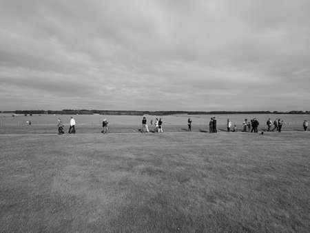 WILTSHIRE, ENGLAND, UK - CIRCA SEPTEMBER 2016: Tourists visiting ruins of Stonehenge prehistoric...