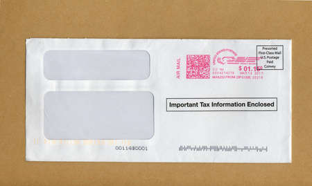 CHARLOTTE, USA - CIRCA MARCH 2017: a letter envelope with important tax information includedのeditorial素材