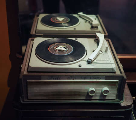 TURIN, ITALY - CIRCA JANUARY 2017: vintage Lesa turntable with 45 rpm single vinyl discのeditorial素材