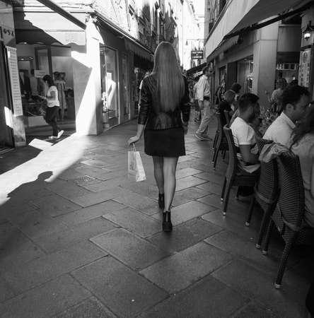 VENICE, ITALY - CIRCA SEPTEMBER 2016: Tourists visiting the city of Venice in black and whiteのeditorial素材