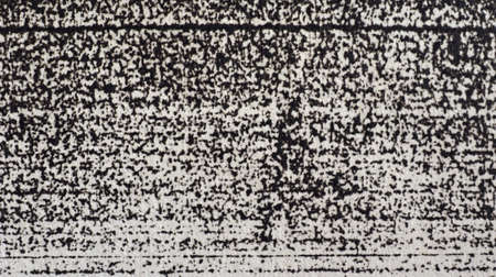 black and white noise printed on paperの写真素材