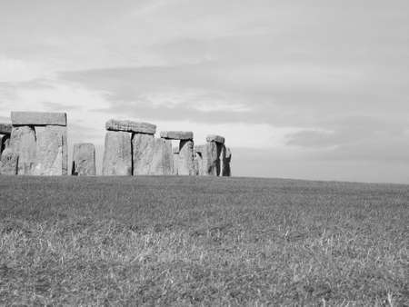 WILTSHIRE, UK - CIRCA SEPTEMBER 2016: Ruins of Stonehenge prehistoric megalithic stone monument in black and whiteのeditorial素材