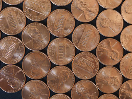 One Cent Dollar coins money (USD), currency of United States over black backgroundの写真素材