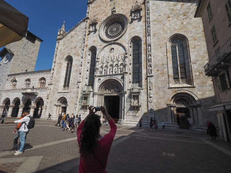 COMO, ITALY - CIRCA APRIL 2017: Santa Maria Assunta Roman Catholic cathedral church and Broletto (town hall)のeditorial素材