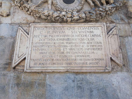COMO, ITALY - CIRCA APRIL 2017: Plaque commemorating Gaius Plinius Secundus aka Pliny the Elder Roman author and natural philosopherのeditorial素材