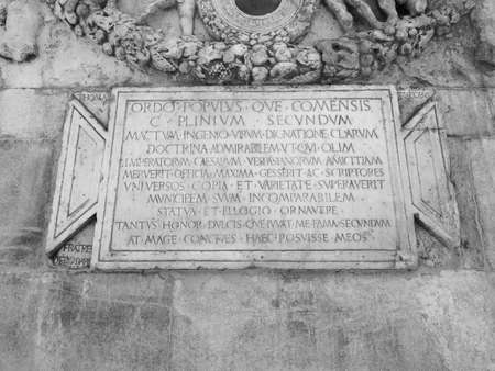 COMO, ITALY - CIRCA APRIL 2017: Plaque commemorating Gaius Plinius Secundus aka Pliny the Elder Roman author and natural philosopher in black_and_whiteのeditorial素材