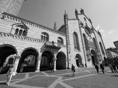 COMO, ITALY - CIRCA APRIL 2017: Santa Maria Assunta Roman Catholic cathedral church and Broletto (town hall) in black and whiteのeditorial素材