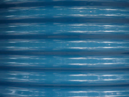 blue corrugated steel texture useful as a backgroundの写真素材