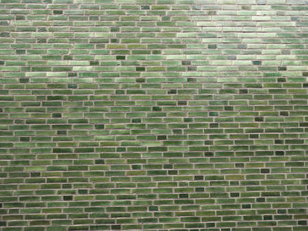 green brick wall useful as a backgroundの写真素材
