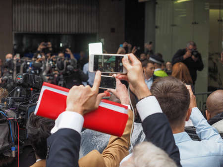 LONDON, UK - JUNE 09, 2017: Press and members of the public waiting for Jeremy Corbyn in Victoria Street on the day following the general elections which resulted in a hung parliamentのeditorial素材