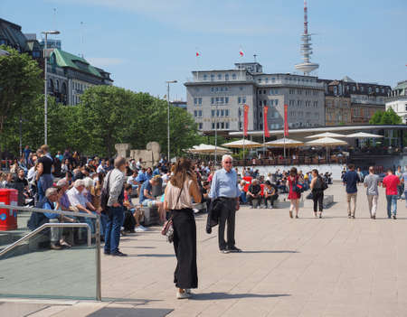 HAMBURG, GERMANY - CIRCA MAY 2017: People on Binnenalster (meaning Inner Alster lake) bank