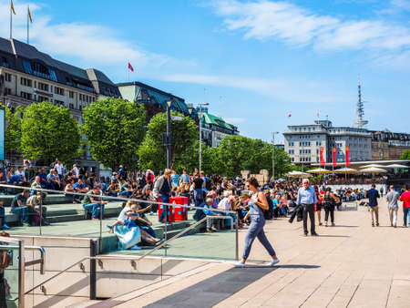 HAMBURG, GERMANY - CIRCA MAY 2017: People on Binnenalster (meaning Inner Alster lake) bank, hdrのeditorial素材