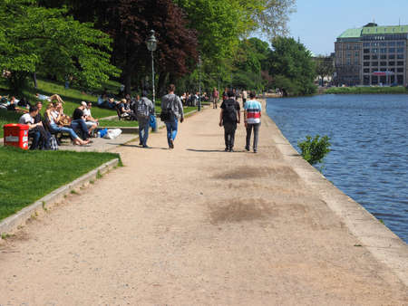 HAMBURG, GERMANY - CIRCA MAY 2017: People on Binnenalster (meaning Inner Alster lake) bank