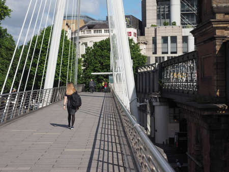 LONDON, UK - CIRCA JUNE 2017: Jubilee Bridge over River Thames links Charing Cross to the South Bank and Waterlooのeditorial素材