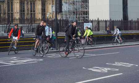 LONDON, UK - CIRCA JUNE 2017: Bicyclists in Parliament square, Westminster