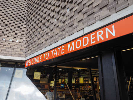 LONDON, UK - CIRCA JUNE 2017: Sculpture named Forward by artist Eric Bulatov in front of the Tavatnik Bulding at Tate Modern art gallery in South Bank power stationのeditorial素材