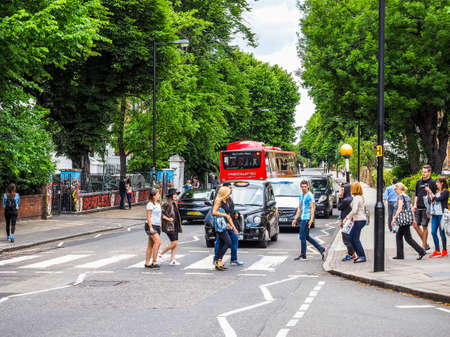 LONDON, UK - CIRCA JUNE 2017: Abbey Road zebra crossing made famous by the 1969 Beatles album cover (high dynamic range)のeditorial素材