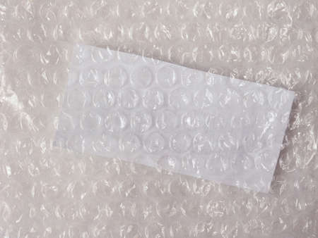 white bubble wrap texture with white label useful as a background