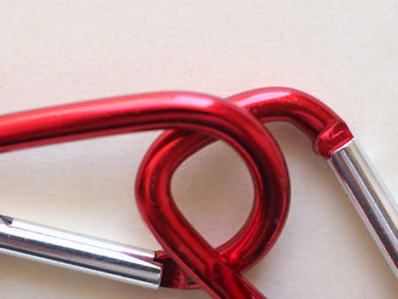 red aluminium keyring hook with copy spaceの写真素材