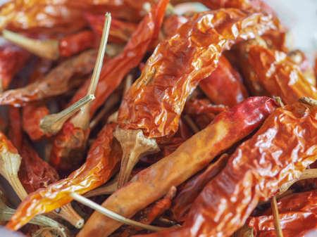 red hot chili peppers (Capsicum) aka chile pepper or chilli pepper vegetables vegetarian and vegan foodの写真素材