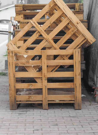 a pile of wooden pallets or skidsの写真素材