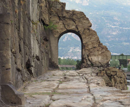 Ancient roman consular road stone arch in Donnas, Italyの写真素材
